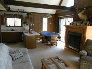 Kitchen, living room, and dining room at Snowman Cabin.